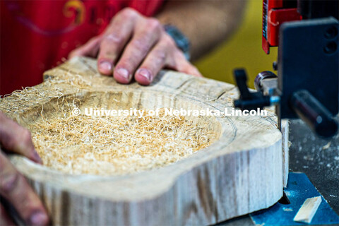 A buildup of wood shavings from the band saw. Architecture design professor Aziza Cyamani is doing a