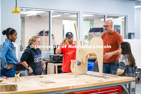 Aziza Cyamani, assistant professor of product design (left), students Elizabeth Loftus, Thomas Geree