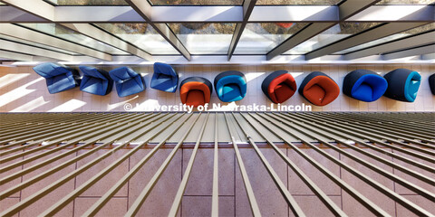 Interior view of chairs in front of the large window in Carolyn Pope Edwards Hall. November 1, 2022.