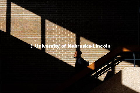 Dezhaun Artis, a first-year law student from Atlanta, walks down the stairs in the law college libra