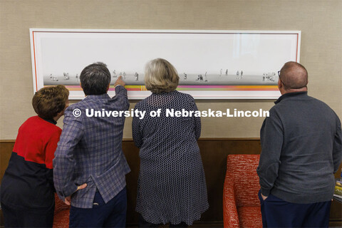 Francisco Souto (second from left) discusses "We Are Nebraska" with members of Chancellor Ronnie Gre