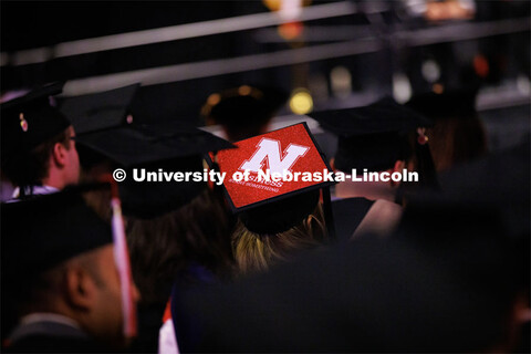 Decorated mortarboard. Graduate Commencement in Pinnacle Bank Arena. December 16, 2022. 