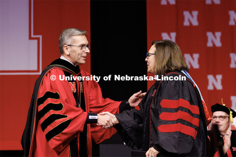 Chancellor Ronnie Green greets Deb Fischer, United States Senator for Nebraska, before she gives the