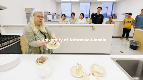 Heather Hallen-Adams describes the mold in cheeses being sampled by the class. FDST 492 - Special To