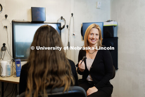 Audiologist Stacie Ray performs a hearing check in the Barkley Clinic. January 31, 2023. 