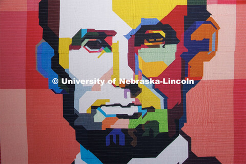 A quilt depicting Abraham Lincoln is on display in the lobby of the Quilt Center. February 8, 2023. 