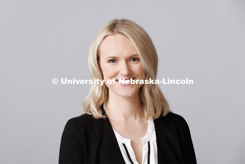 Studio portrait of Megan Monzon, Assistant Director, New Student Enrollment coordinator at ASEM. Mar