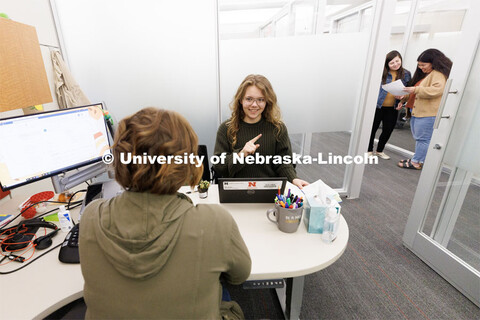 Laura Britten, Academic Navigator works with a student in the Explore Center. Explore Center photo s