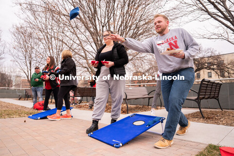 Out-of-state students enjoy playing outdoor games including corn hole during student admission’s N