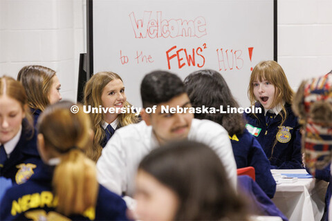 Carolina Thompson, right, from Omaha Bryant FFA reacts as she and Megan Kindschuh from Axtell FFA ex