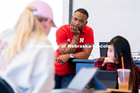 Ahman Green listens as students plan an esports event during his Intro to Esports class in Andersen 