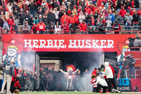 The new iteration of Herbie Husker rides onto the field inside Memorial Stadium before the Husker fo