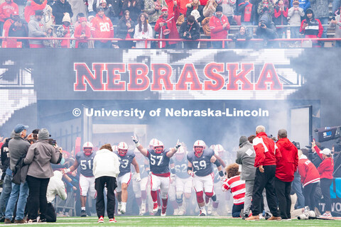 The husker football team takes the field before the spring game. April 22, 2023. 