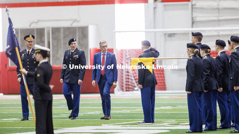 Chancellor Ronnie Green presents the Chancellor’s Academic Excellence Award to Midshipman Colin Ha