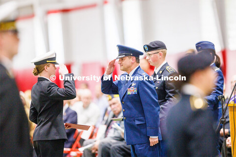 Colonel (Ret.) Joe Brownell presents an award at the ROTC Joint Service Chancellor’s Review. April