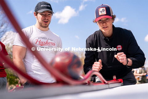 Junior Civil Engineering major John Colt, left, watches as freshman Ben McGinnis plays a game at the
