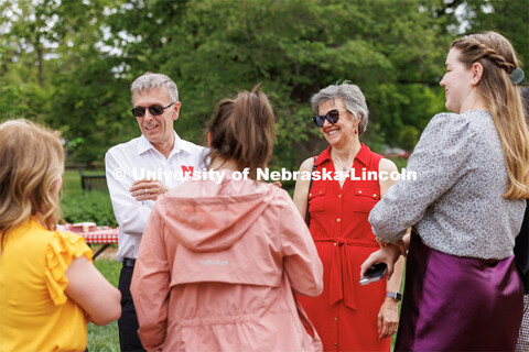 The Greens smile as they greet fellow Huskers during the open house. Ronnie and Jane Green had an op
