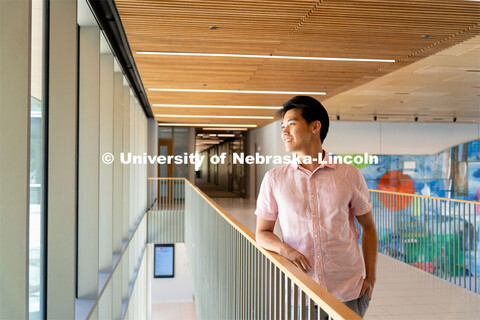 Andre Nguyen, Junior in Nutritional Science and Dietetics, smiles for a photo inside the Gwendolyn A