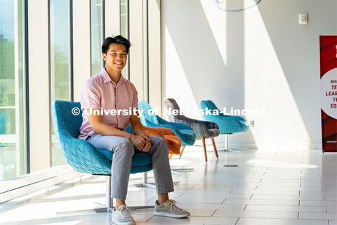 Andre Nguyen, Junior in Nutritional Science and Dietetics, smiles for a photo inside the Gwendolyn A