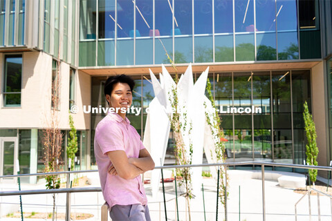 Andre Nguyen, Junior in Nutritional Science and Dietetics, smiles for a photo outside the Gwendolyn 