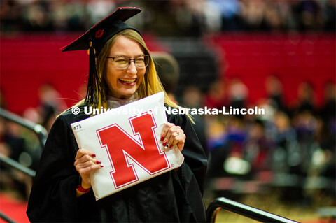 Christa Rahl smiles after receiving her master’s degree. 2023 Spring Graduate Commencement in Bob 