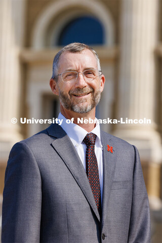 Rick Bevins, Professor of Psychology, and Associate Vice Chancellor of Research (pictured outside of