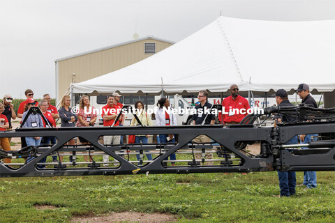 Chancellor Rodney Bennett and the road tour listens as Quentin Cooksley, Director of Commercial and 