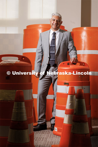 Aemal Khattak, Director of the Mid-America Transportation Center is surrounded by a bunch of traffic