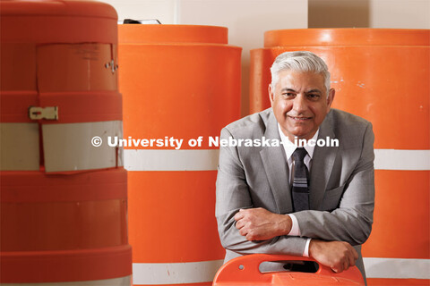 Aemal Khattak, Director of the Mid-America Transportation Center is surrounded by a bunch of traffic