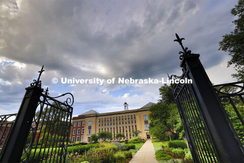 Dark clouds above Love Library and the Love gardens. August 13, 2023. 