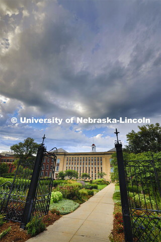 Dark clouds above Love Library and the Love gardens. August 13, 2023. 