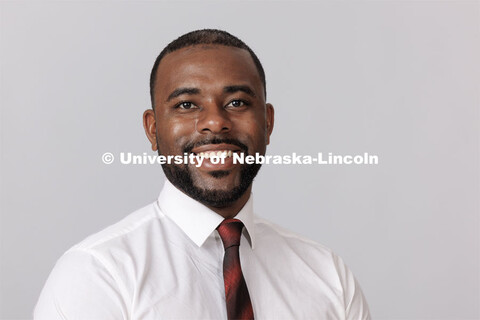 Studio portrait of Akeem Holmes, Senior Assistant Director for Next Chapter Programs. ASEM Admission