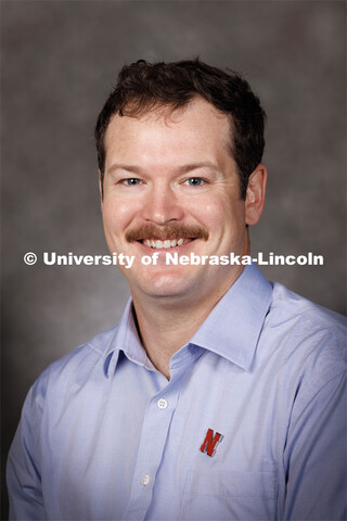 Studio portrait of Dillon Fogarty, Research Assistant Professor, Agronomy and Horticulture. 2023 New