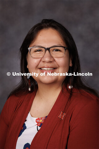 Studio portrait of Angel Hinzo, Assistant Professor of History and Ethnic Studies. 2023 New Faculty 