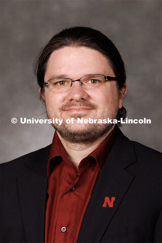 Studio portrait of Evan Rich, Assistant Professor of Physics and Astronomy. 2023 New Faculty Orienta