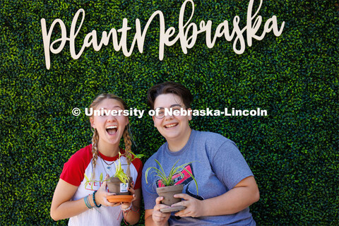Shae Mitchell, a freshman from Edison, Nebraska, center, and Emmy Oldham, a freshman from Wellfleet,