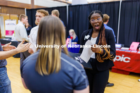 Maryam Sule talks with a recruiter at the Career Fair in the Nebraska Union. September 20, 2023. 