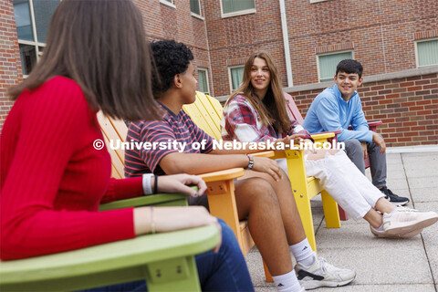 Raikes School students socialize on the rooftop patio of the Kauffman Academic Residential Center. R