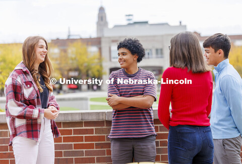 Raikes School students socialize on the rooftop patio of the Kauffman Academic Residential Center. R