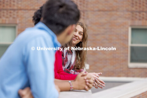 Raikes School students socialize on the rooftop patio of the Kauffman Academic Residential Center. R