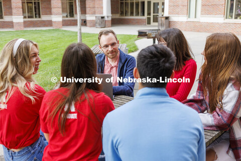 Assistant Professor Seth Polsley holds class outdoors of the Kauffman Academic Residential Center. R