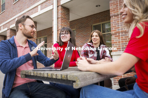 Assistant Professor Seth Polsley holds class outdoors of the Kauffman Academic Residential Center. R