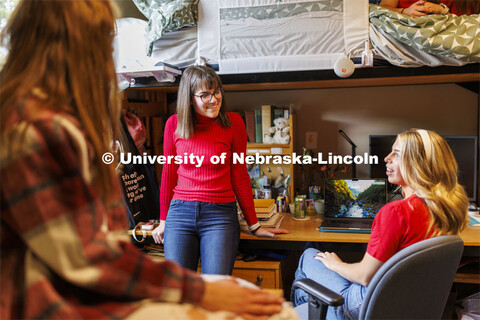 Students hangout together in a  Kauffman Academic Center dorm room. Raikes School photo shoot. Octob