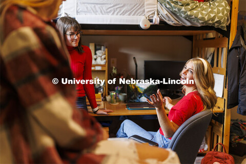 Students hangout together in a  Kauffman Academic Center dorm room. Raikes School photo shoot. Octob