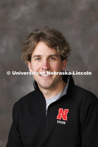 Studio portrait of Wes Gorans, NCPA Coordinator, Nebraska College Preparatory Academy (NCPA) advisor