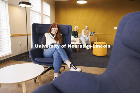 Sarah Danahy, left, Madalyn Schoneman and Alexis Tenorio study in the Knoll Residential Center loung