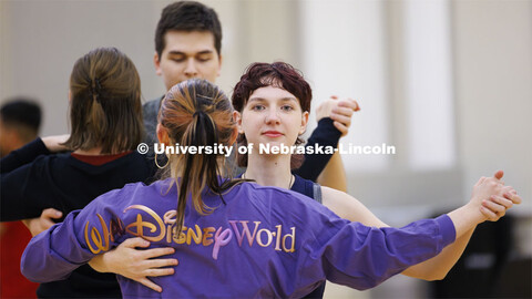 Lyndi Weber dances Atley Van Emmerik across the ballroom. Ballroom Dancing Club works through their 