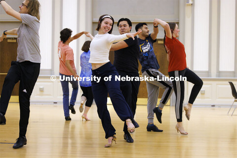 Grace Thomsen and Calen Bernbeck do a quick-step dance with the gold group. Ballroom Dancing Club wo