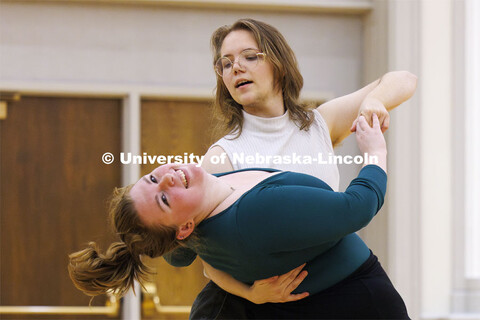 Sam Anthony Pharris dips Arielle Monson. Ballroom Dancing Club works through their final practice in