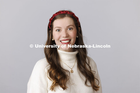 Studio portrait of Allie Woolworth, New Student Enrollment Orientation Training and Development Coor